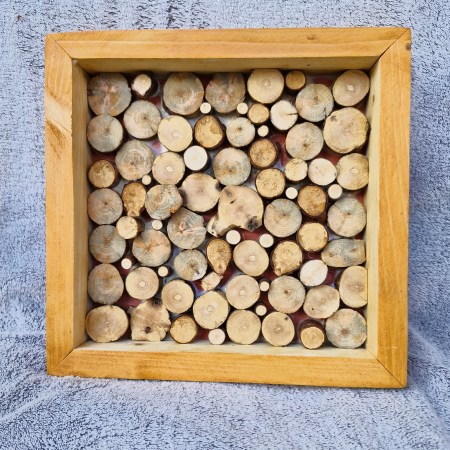 Kleines Rahmenbild aus Holzscheiben